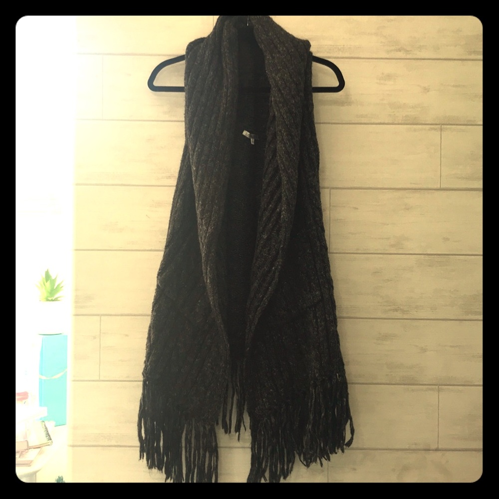 Sleeveless CAbi cardigan.